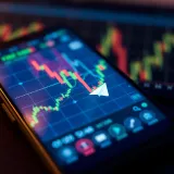 Graph showing forex market trends with digital signals overlay on a smartphone screen